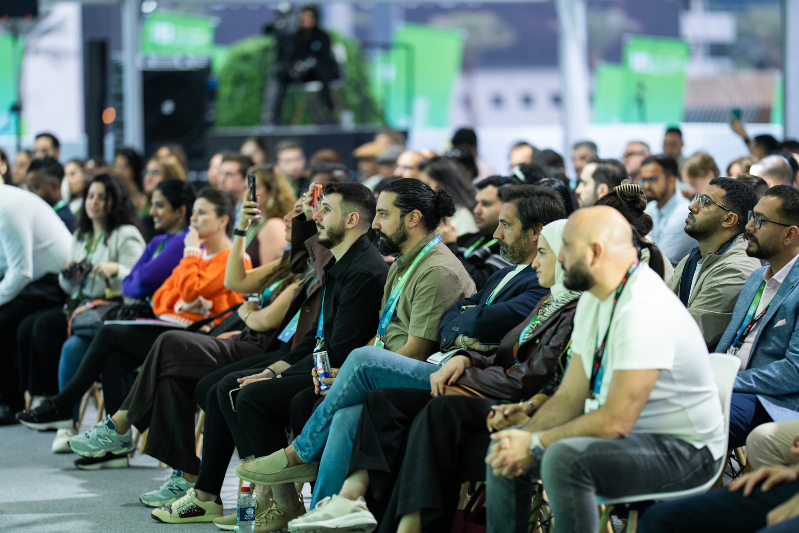 People listening together during a live discussion